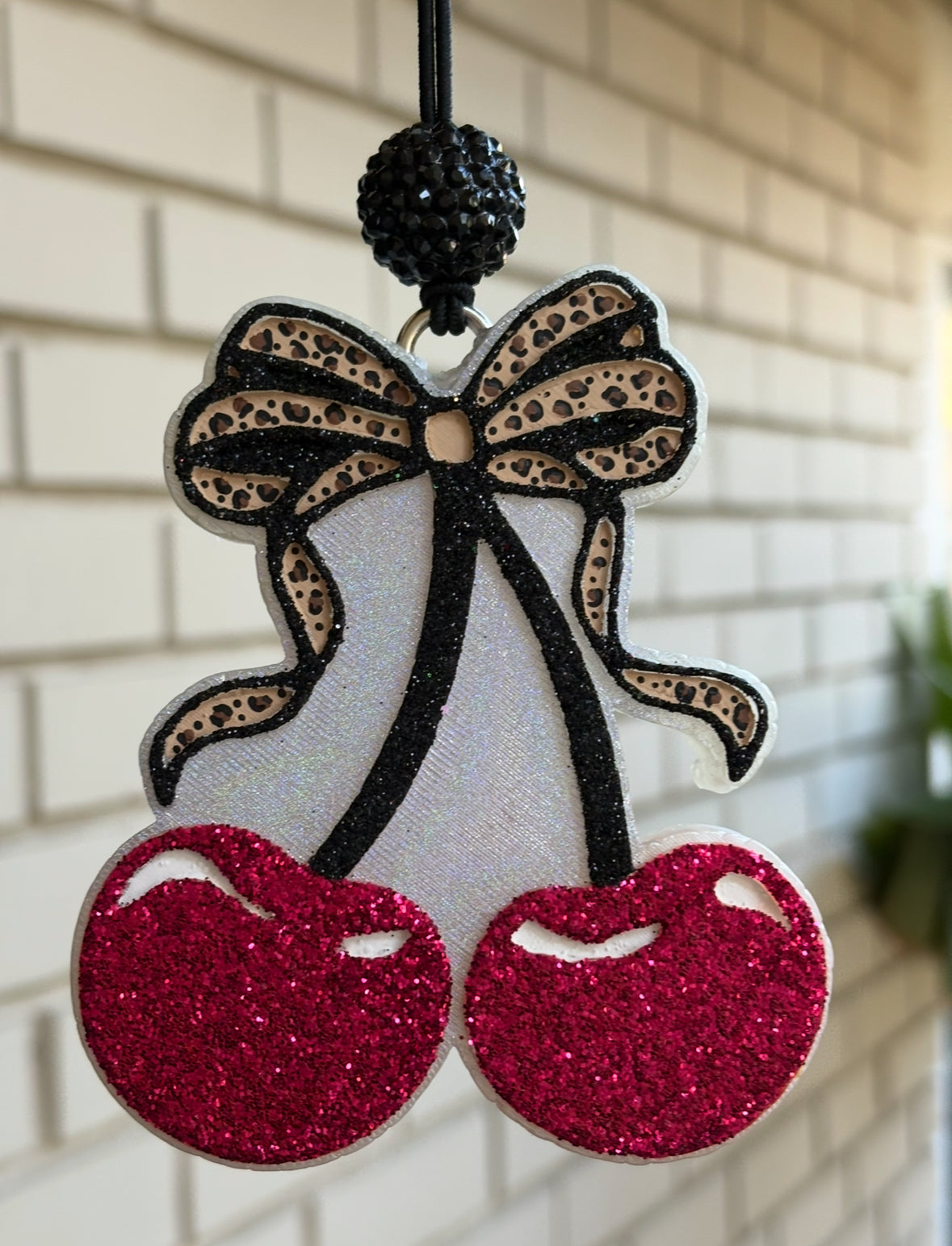 Bougie cherries with leopard bow ￼